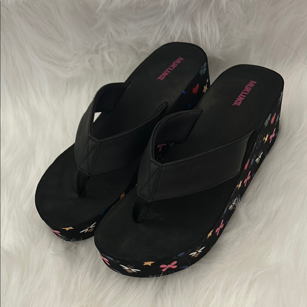 Muk Luks Women's Black Platform Flip Flops with Colorful Accents